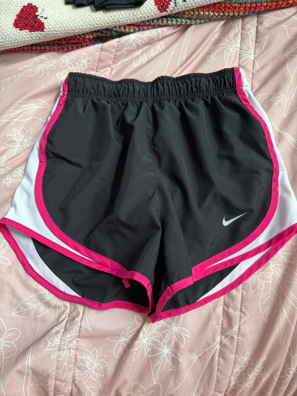 Nike Black Athletic Shorts with Pink Trim and White Panels